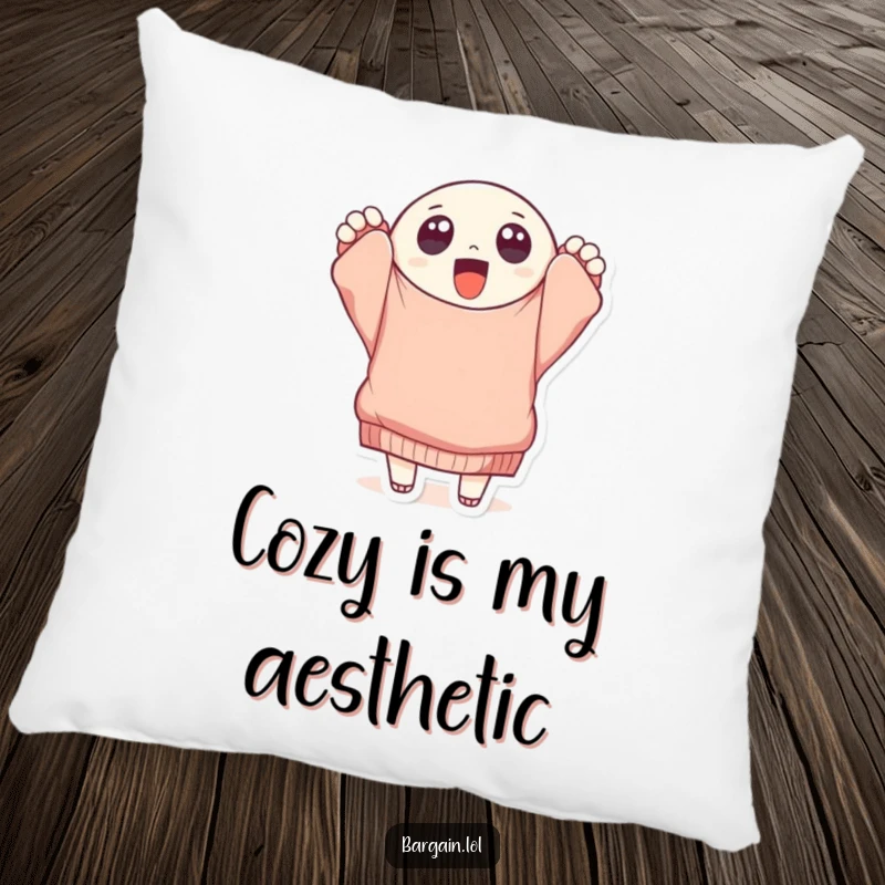 Funny round character with big eyes holding a tattered, oversized sweater, featured on a plush pillow for humorous comfort.