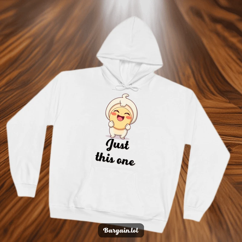 Funny Hoodie: A cheerful small creature smiles widely, holding a ridiculously large button, showing immense pride and amusement.