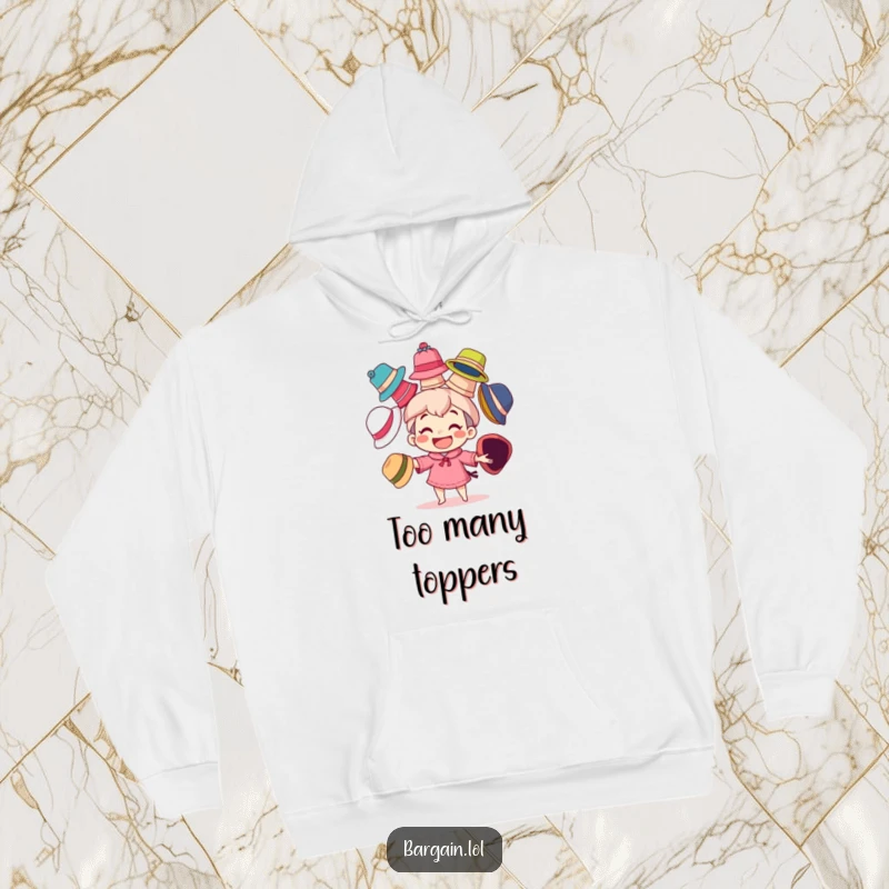 Funny hoodie with a character's big grin playfully juggling many mismatched, colorful hats, embodying warm, humorous style.