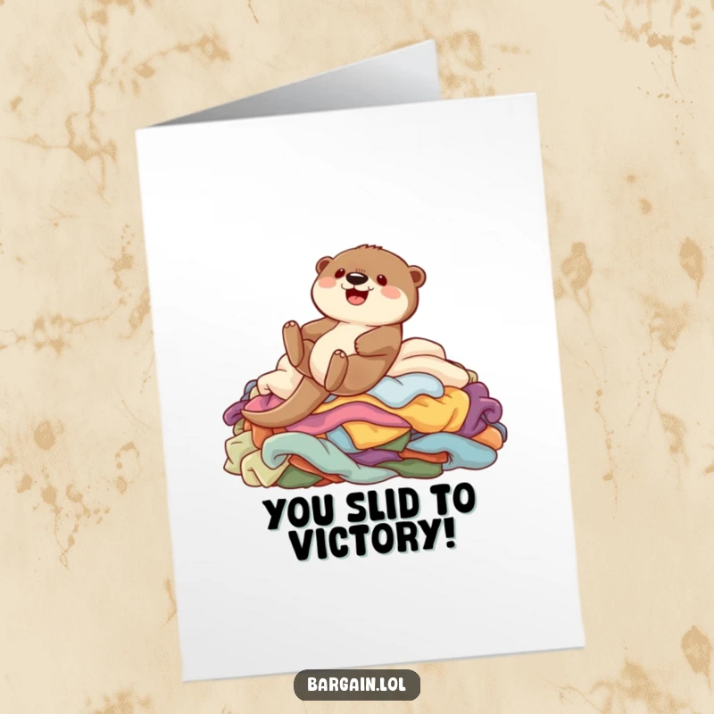 Funny Free Printable Congratulations Card: Otter gleefully sliding down clothes pile, ideal for a DIY gift.